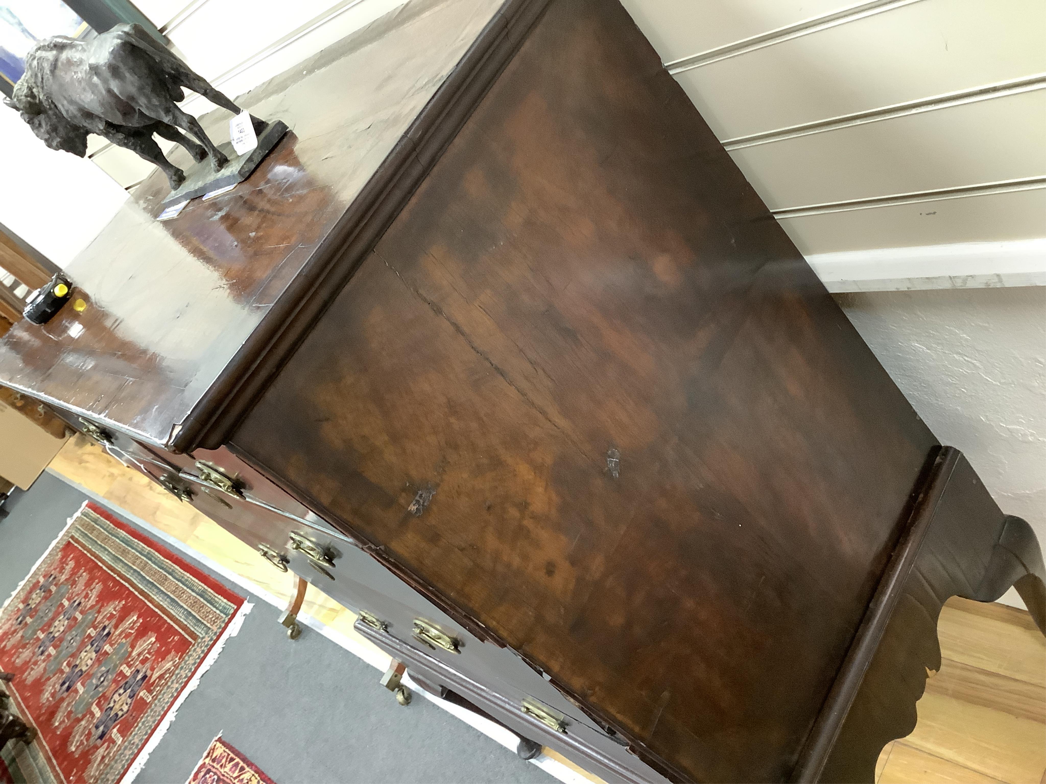 An 18th century banded walnut chest on stand, width 98cm, depth 54cm, height 131cm